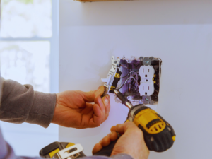 electrician upgrading to smart outlets & switches