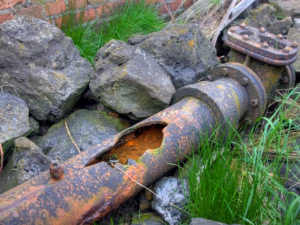 cast iron sewer line that has deteriorated because of age 