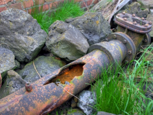 cast iron sewer line that has deteriorated because of age 