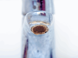 corroded bathroom faucet 