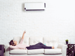female homeowner enjoy heat and cooling options from mini split system